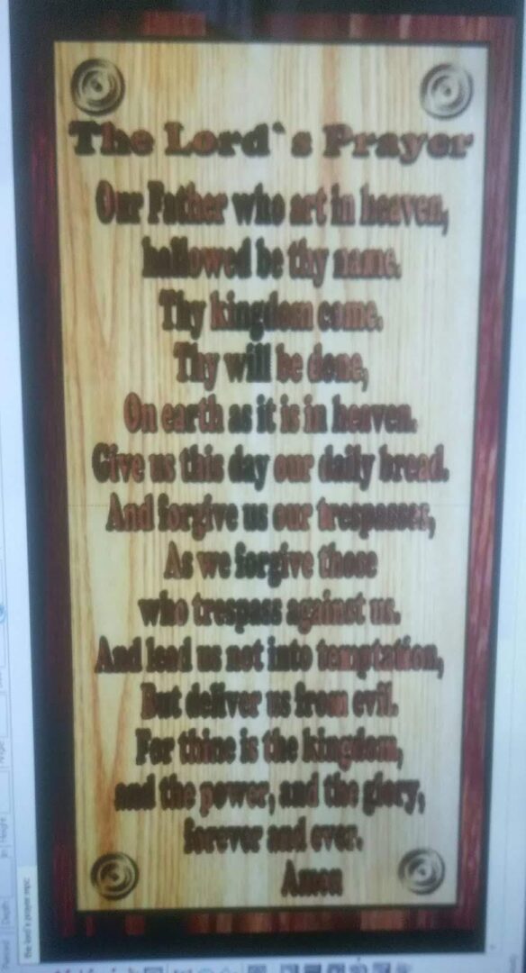 The Lord’s Prayer printed on wood