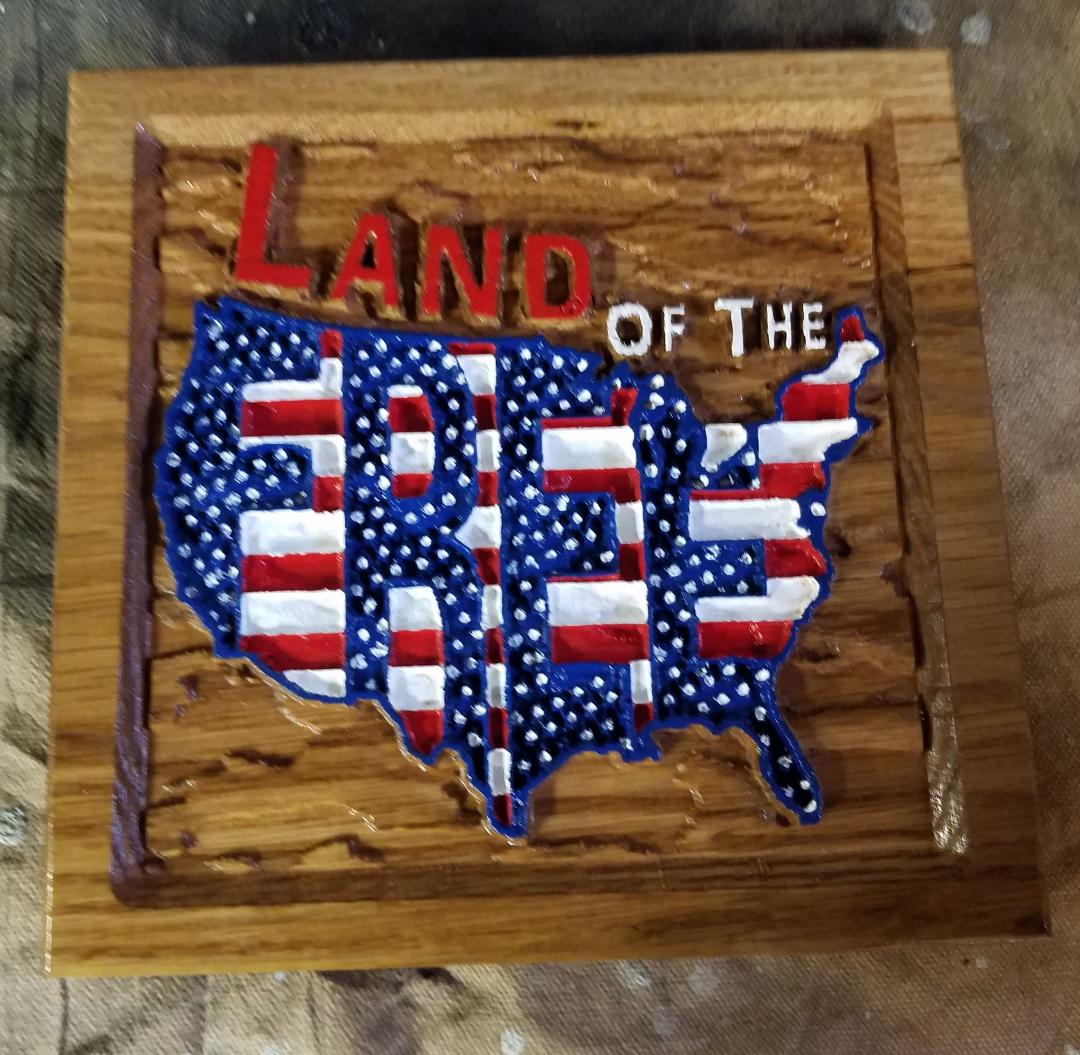 land of the free wood carving
