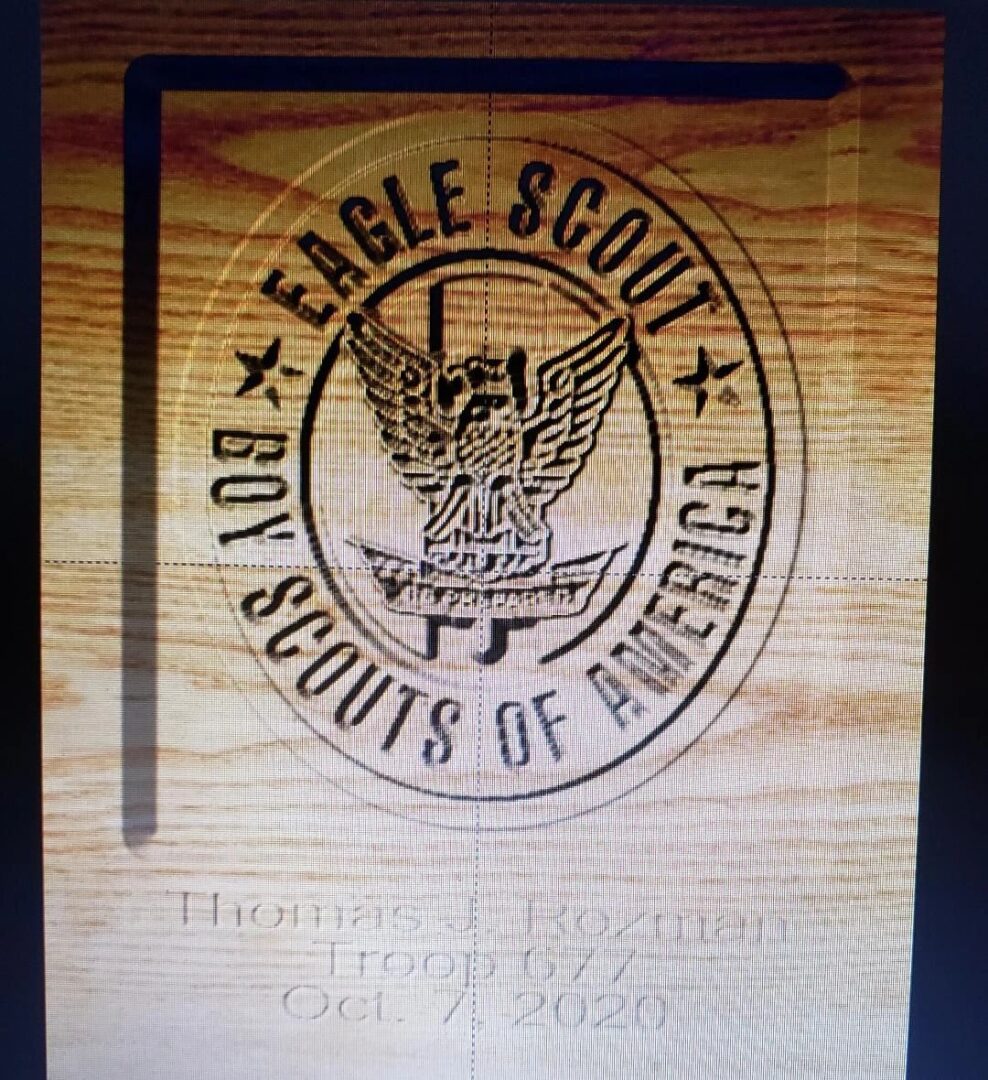 Eagle Scout seal carved on wood