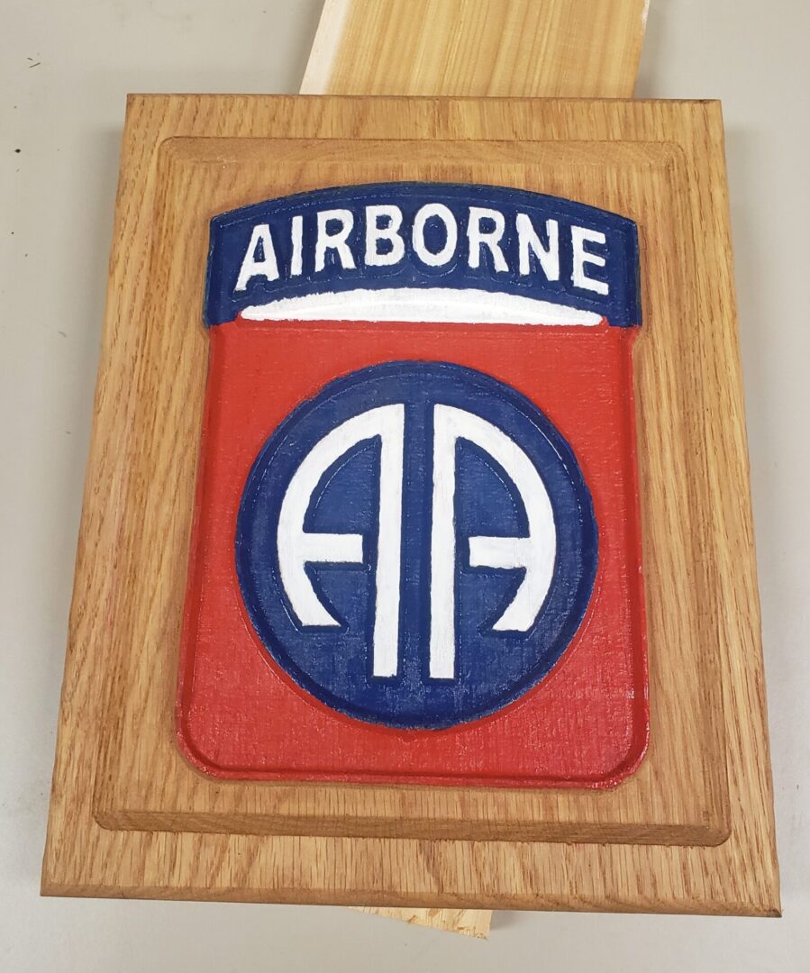 Airborne carved on wood