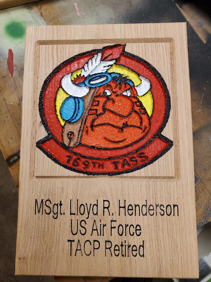 The logo of msgt lloyd henderson us air force