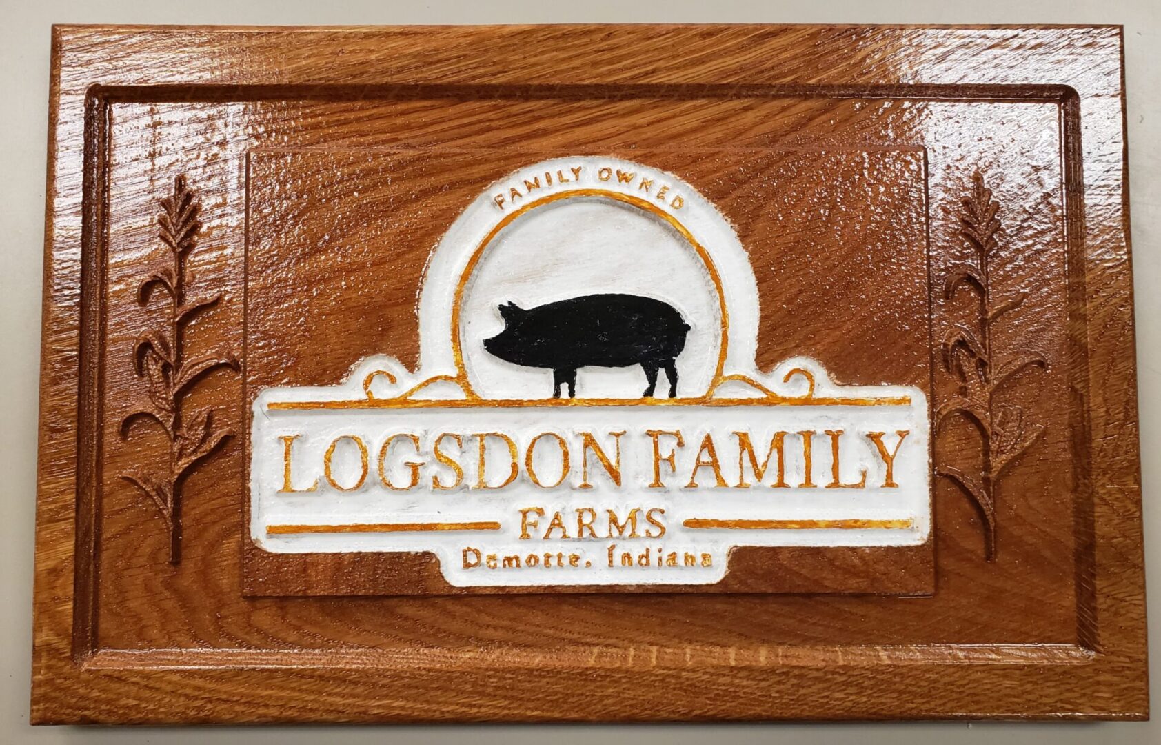 The wooden carving of logsdon family farms
