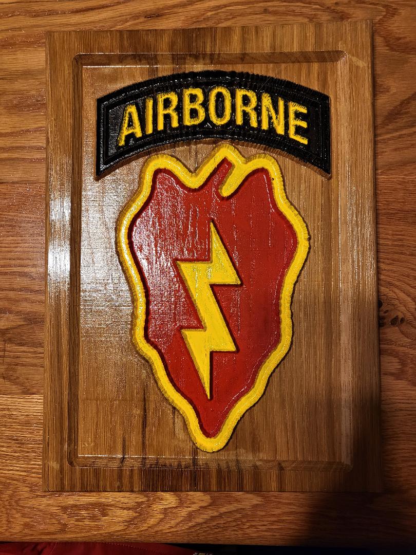 A wooden carving of Airborne