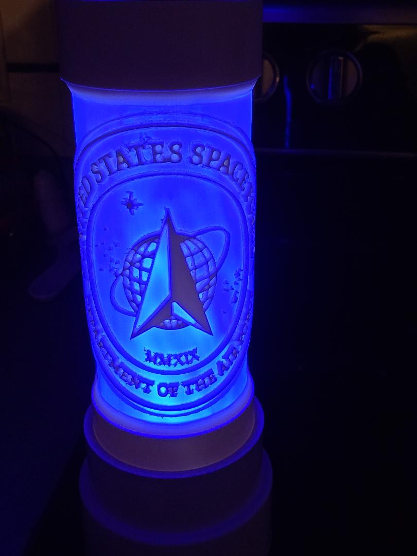 Space Force logo glowing in the dark
